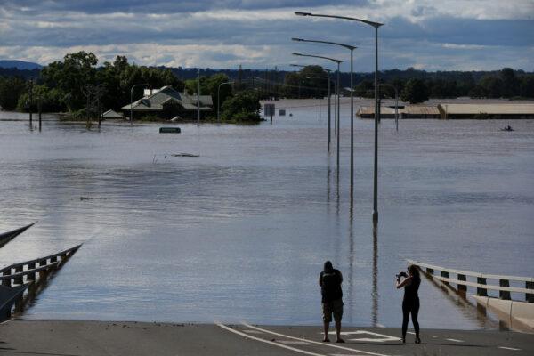 The Windsor Bridge is seen inundated by floodwaters along the Hawkesbury River in Sydney, Australia on March 09, 2022. (Photo by Lisa Maree Williams/Getty Images)