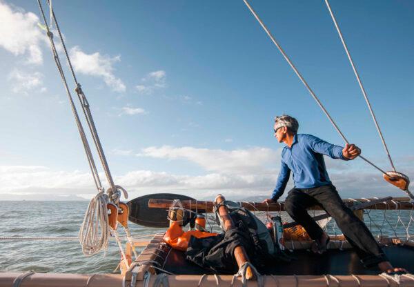 Wayfinding navigators such as Nainoa Thompson keep constant watch over the horizon; the weather; the wind, sun, and stars. (Courtesy of Polynesian Voyaging Society)