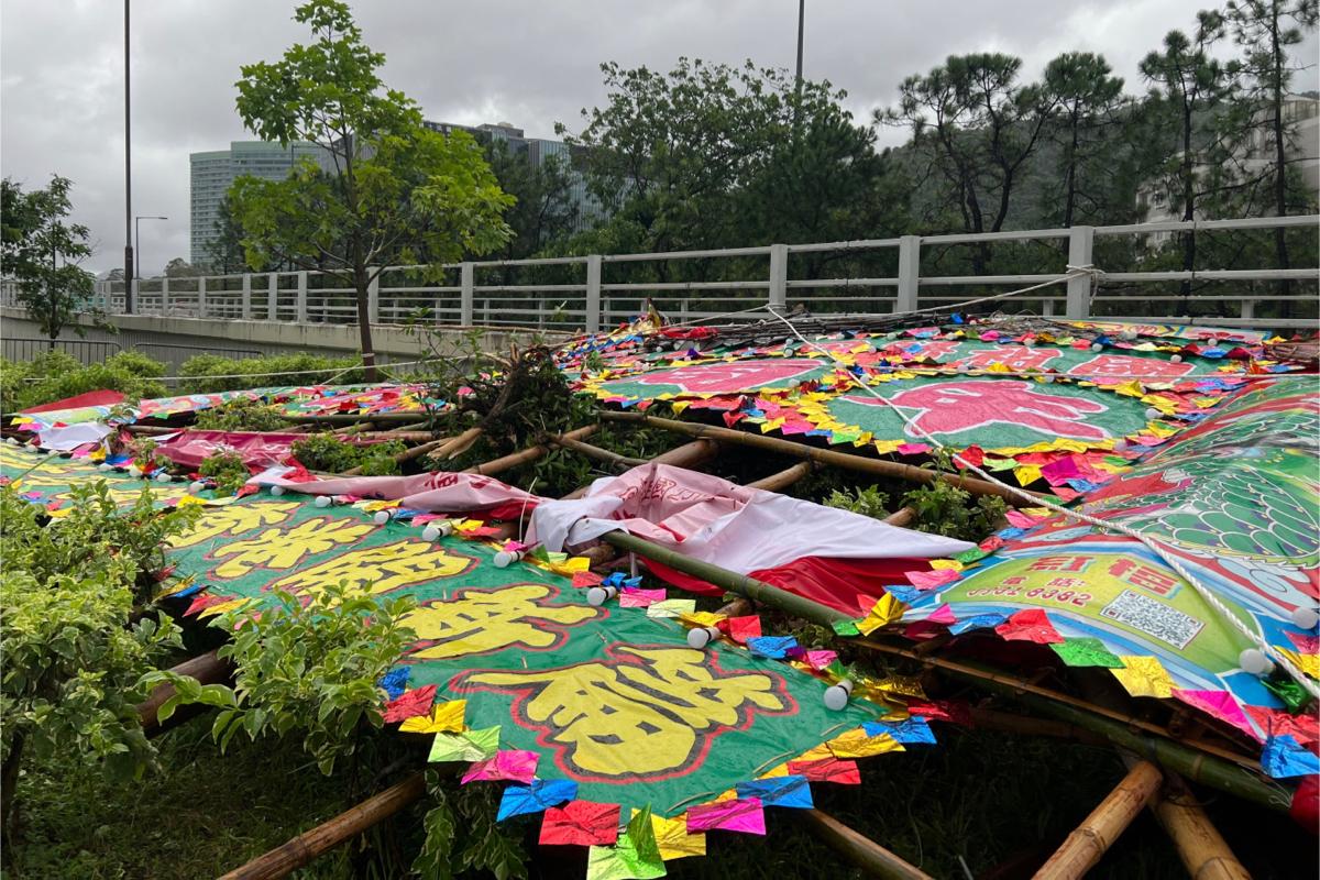 Exhibition Banners were damaged by storms near the Chinese University of Hong Kong on July 2, 2022. (TM Chan/The Epoch Times)