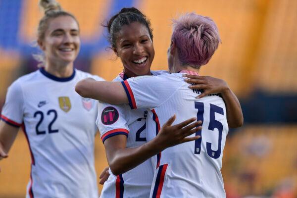 (L-R) Margaret "Midge" Purce of USA celebrates with teammate Megan Rapinoe after scoring the third goal of his team during the match between United States and Haiti as part of the 2022 Concacaf W Championship at Universitario Stadium, in Monterrey, Mexico, on July 04, 2022. (Azael Rodriguez/Getty Images)