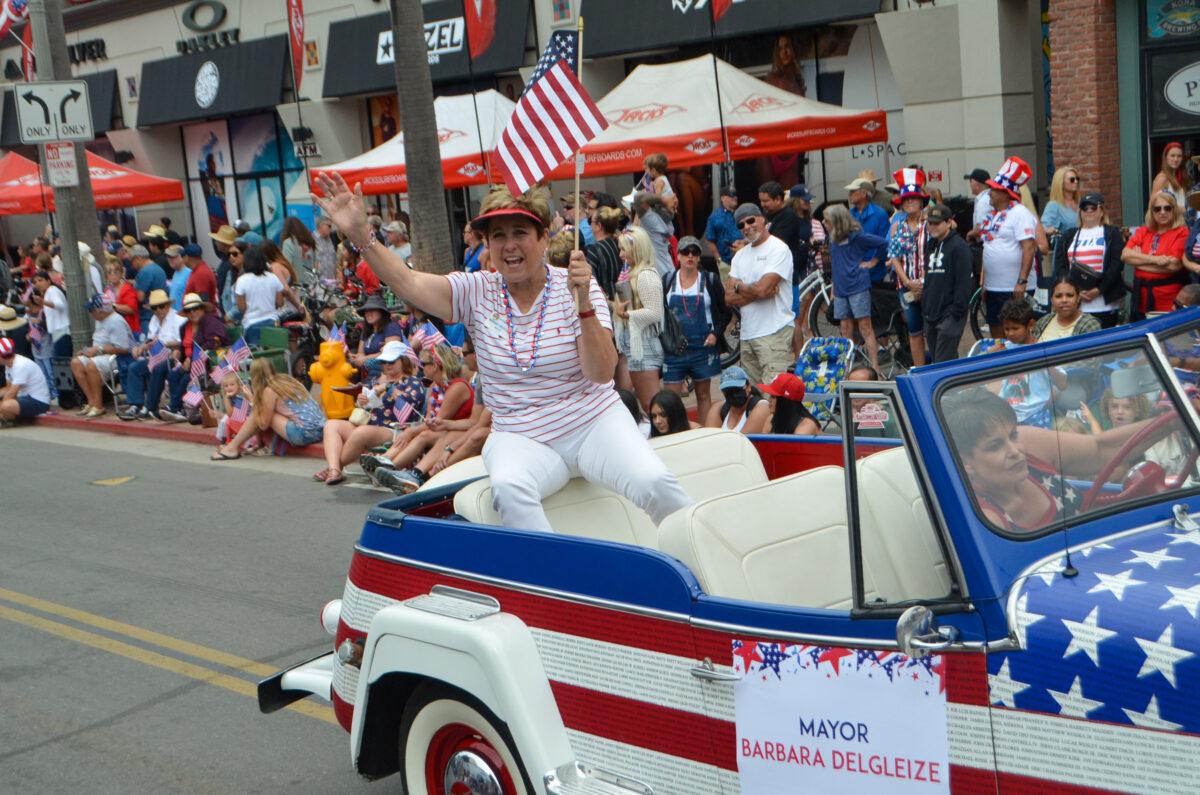 Huntington Beach Mayor Barbara Delgleize participates in the Fourth of July Parade in Huntington Beach, Calif., on July 4, 2022. (Alex Lee/The Epoch Times)