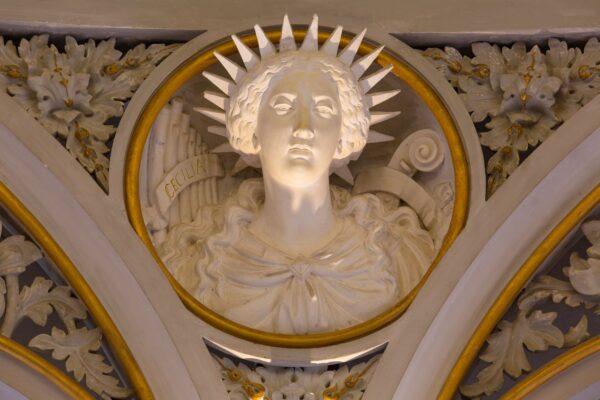 A detail of the bust of St. Cecilia, patron saint of music, at the base of the music room’s cupola. Architectural elements are combined with relief sculptures to express the physical and symbolic beauty of the romantic palace. (José Marques Silv/Parks of Sintra and Monte de Lua)