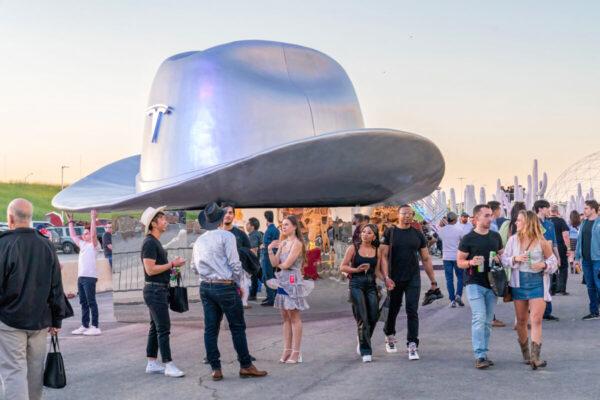 A giant cowboy hat is on display outside the Tesla Giga Texas manufacturing facility during the "Cyber Rodeo" grand opening party in Austin, Texas, on April 7, 2022. (Suzanne Cordeiro/AFP via Getty Images)