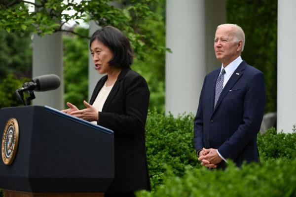 U.S. President Joe Biden watches as U.S. Trade Representative Katherine Tai speaks in the Rose Garden of the White House during a reception to celebrate Asian American, Native Hawaiian, and Pacific Islander Heritage Month in Washington on May 17, 2022. (ROBERTO SCHMIDT/AFP via Getty Images)