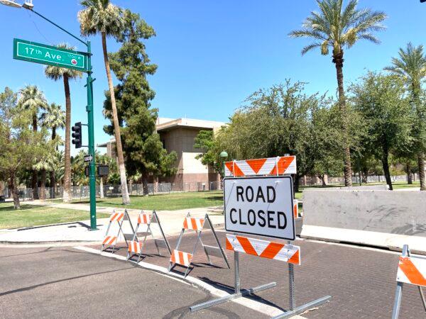A portion of 17th Avenue in front of Arizona's state capitol complex in Phoenix was closed following a June 24 protest that damaged state property. (Allan Stein/The Epoch Times)