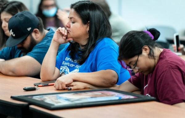 Family members attend a city council meeting to get answers about the May 24 mass school shooting that left 19 children and two teachers dead, in Uvalde, Texas, on June 30, 2022. (Charlotte Cuthbertson/The Epoch Times)