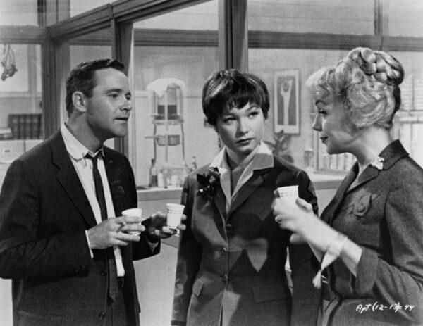 (L–R) Jack Lemmon, Shirley MacLaine, and Edie Adams in "The Apartment." (The Mirisch Company)