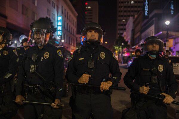 San Diego Police line up in downtown San Diego on May 31, 2020. (Ariana Drehsler/AFP via Getty Images)