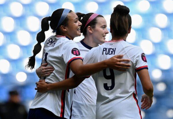  USA's Sophia Smith (L) celebrates with teammates after scoring a goal against Jamaica during their 2022 women's Concacaf football championship match at the BBVA Bancomer stadium in Monterrey, Mexico, on July 7, 2022. (Alfredo Estrella /Getty Images)