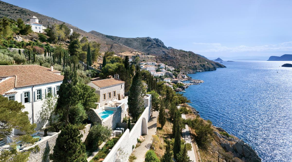 Cyana overlooks the ancient coast road to Hydra Port and affords a panoramic view of the Sardonic Sea and the Peloponnese beyond. (Courtesy of Greece Sotheby's International Realty)