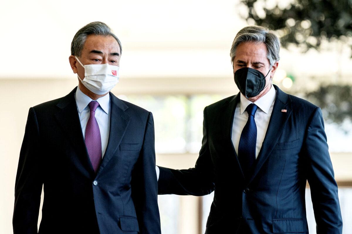 U.S. Secretary of State Antony Blinken meets Chinese Foreign Minister Wang Yi during a meeting in Nusa Dua, Bali, Indonesia, on July 9, 2022. (Stefani Reynolds/Pool via Reuters)