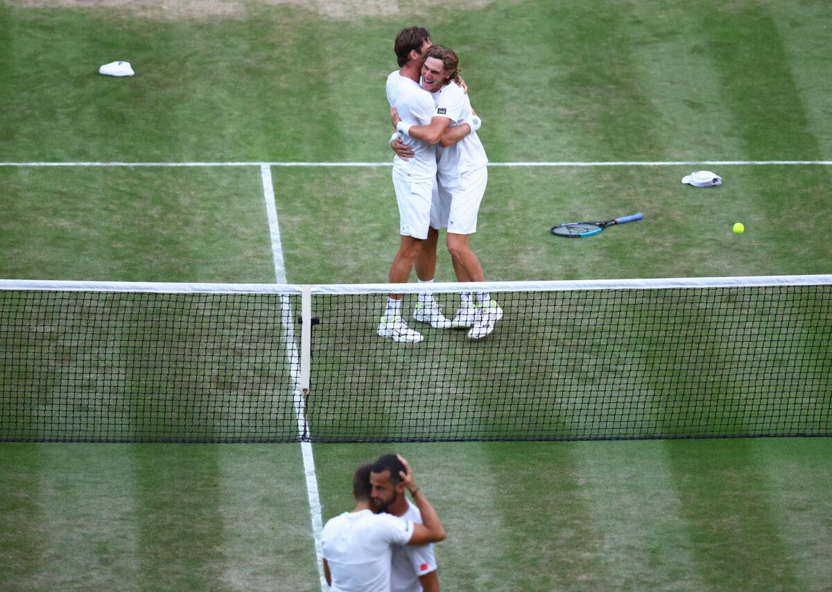 Australia's Matthew Ebden and Max Purcell celebrate winning their men's doubles final against Croatia's Nikola Mektic and Mate Pavic on day thirteen of the Wimbledon tennis championships in London on July 9, 2022. (Hannah Mckay/Reuters)