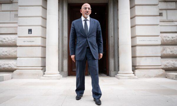 Chancellor Nadhim Zahawi poses for a photograph outside the Treasury in Westminster, London, on July 6, 2022. (Stefan Rousseau/PA Media)