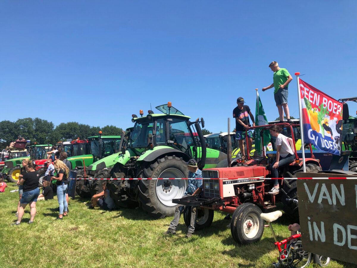 Dutch farmers protesting against the government’s plans to reduce emissions of nitrogen oxide and ammonia gather for a demonstration at Stroe, Netherlands, on June 22, 2022. (Aleksandar Furtula/AP Photo)