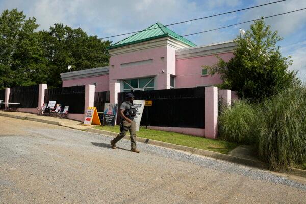 A security officer walks in front of the Jackson Women's Health Organization clinic in Jackson, Miss., on July 3, 2022. (Rogelio V. Solis/AP Photo)