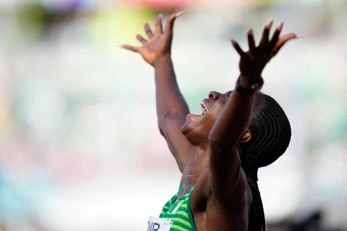 Tobi Amusan of Nigeria reacts after winning the women's 100-meter hurdles semifinal at the World Athletics Championships in Eugene, Ore., on July 24, 2022. (Ashley Landis/AP Photo)