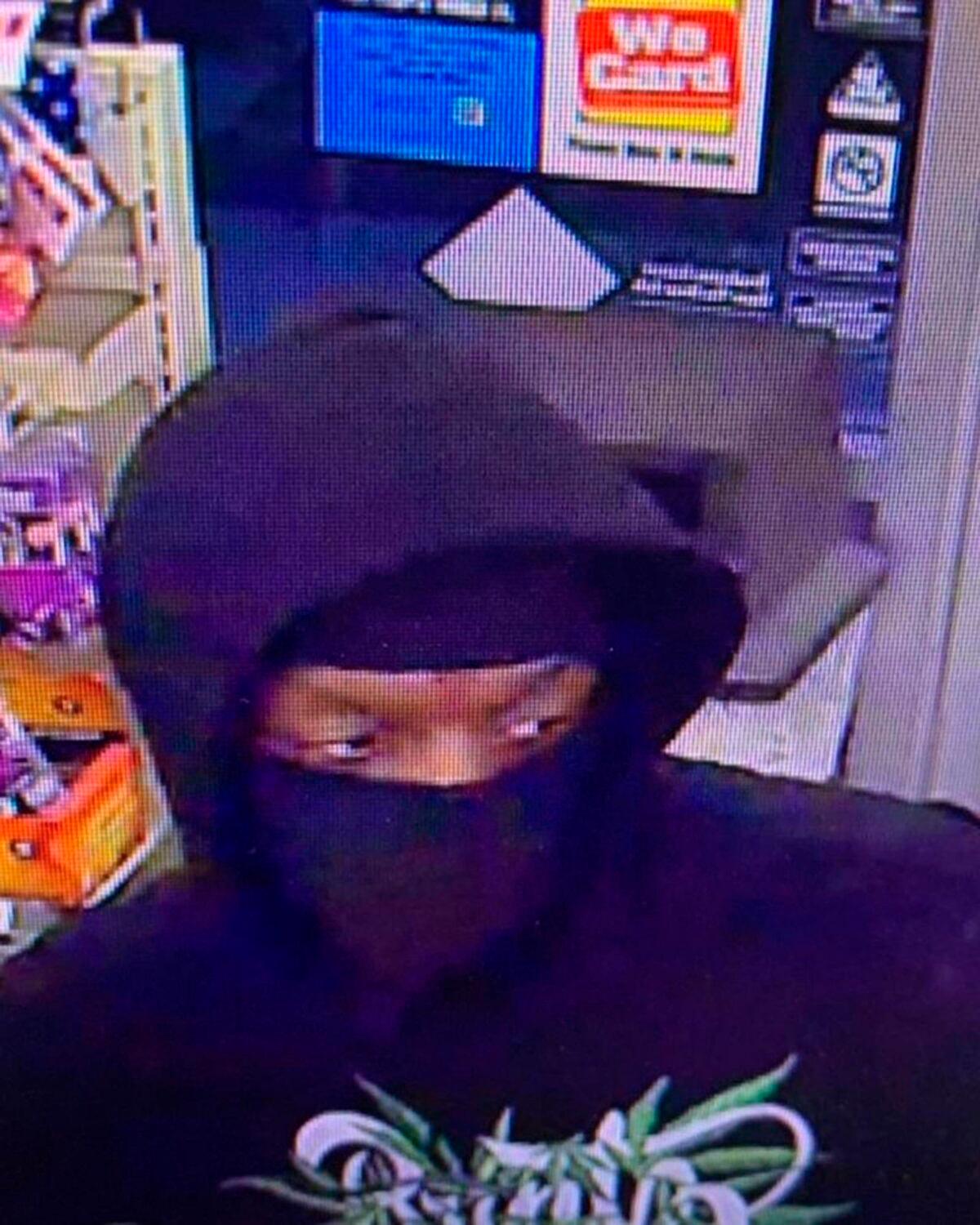 A person that police are attempting to identify in connection with two people who were killed and three who were wounded in shootings at four 7-Eleven locations in Southern California on July 11, 2022. (Brea Police Department via AP)