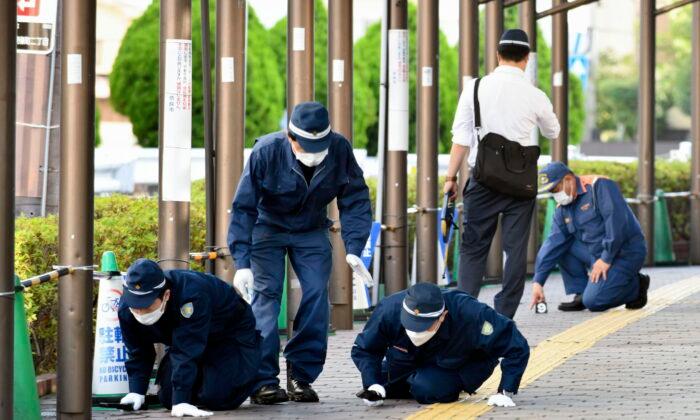 Japan Police Find Bullet Marks Near Abe Assassination Site