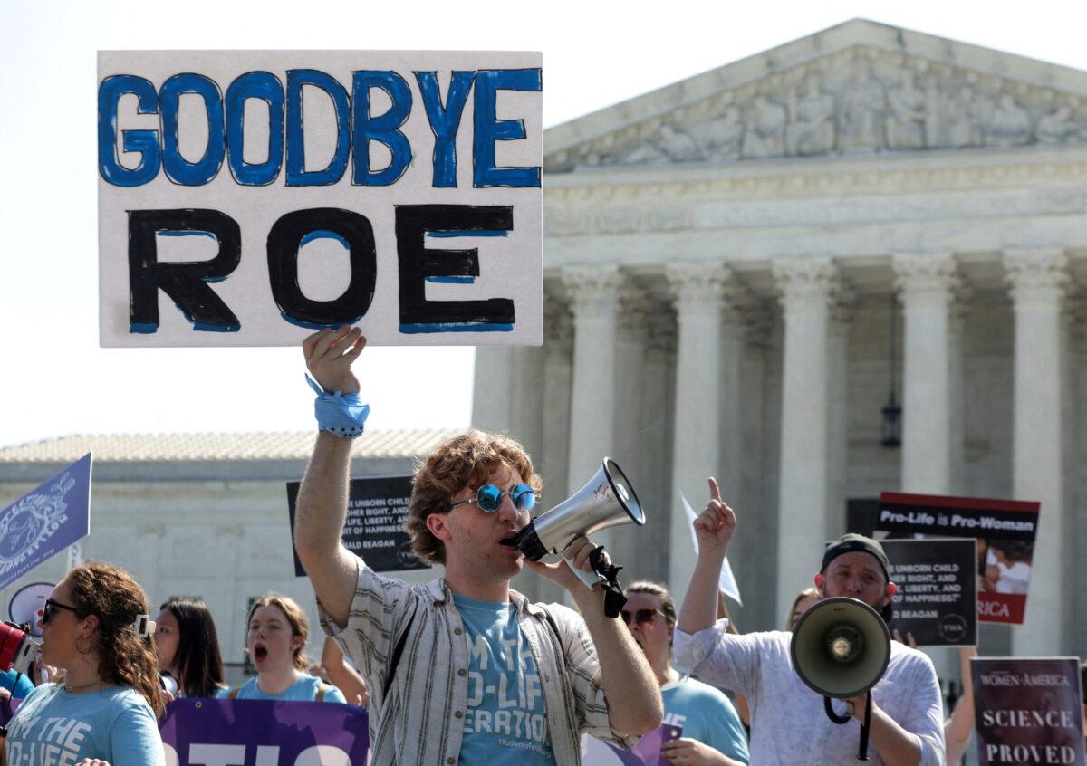 Anti-abortion activists demonstrate outside the Supreme Court of the United States in Washington on June 13, 2022. (Evelyn Hockstein/Reuters)