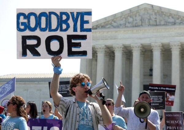 Pro-Life activists demonstrate outside the U.S. Supreme Court in Washington, in June 2022, days before the Court overturned 1973's Roe v. Wade ruling. (Evelyn Hockstein/Reuters)