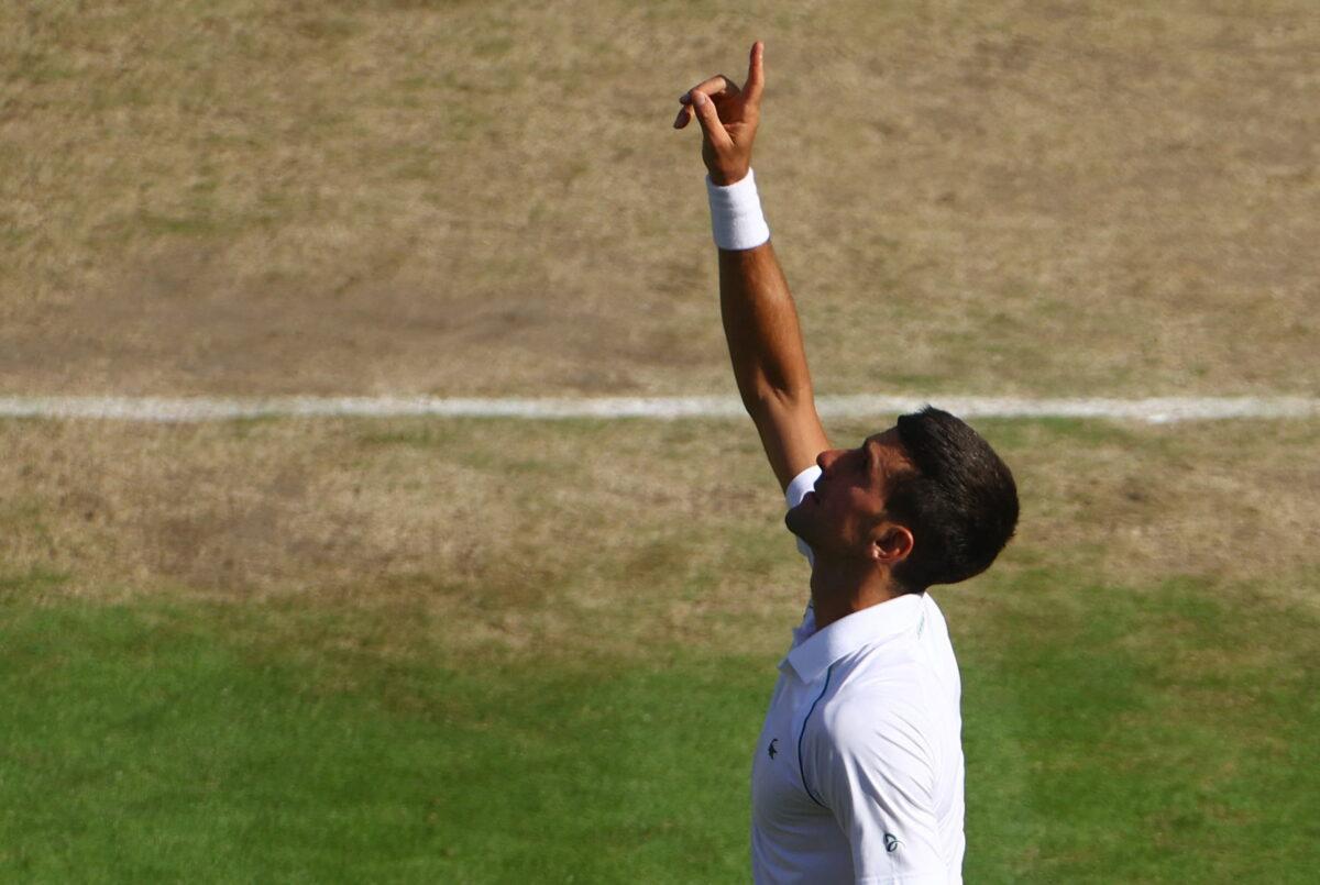 Serbia's Novak Djokovic celebrates winning his semifinal match against Britain's Cameron Norrie in London on July 8, 2022. (Hannah Mckay/Reuters)