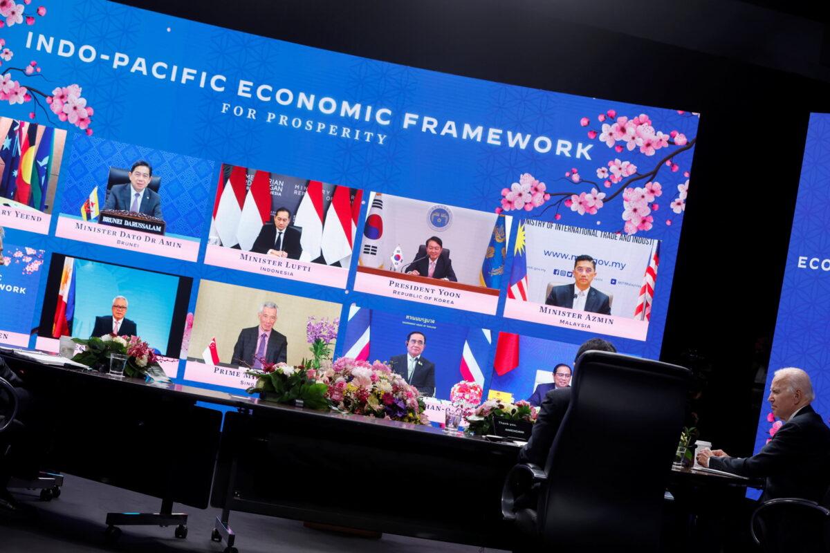 U.S. President Joe Biden listens to other leaders participating in the Indo-Pacific Economic Framework for Prosperity (IPEF) launch event virtually, at Izumi Garden Gallery in Tokyo on May 23, 2022. (Jonathan Ernst/Reuters)