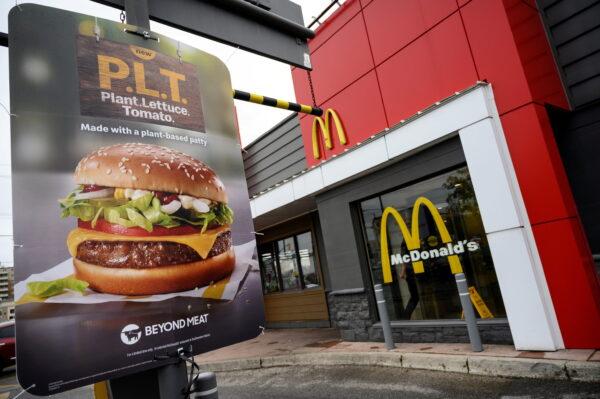 A sign promoting McDonald's "PLT" burger with a Beyond Meat plant-based patty at one of 28 test restaurant locations in Ontario, Canada, on October 2, 2019. (Reuters/Moe Doiron)