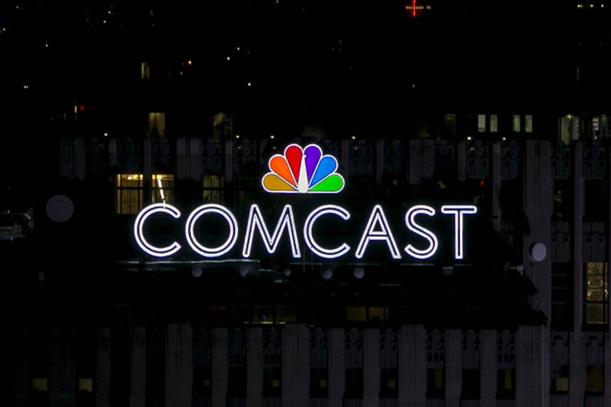 The NBC and Comcast logos are displayed atop 30 Rockefeller Plaza, formerly known as the GE building, in midtown Manhattan in New York on July 1, 2015. (Brendan McDermid/Reuters)
