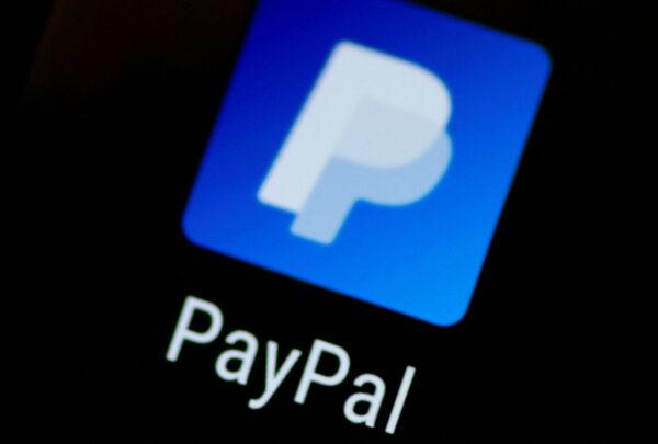 ‘New Years’ Nightmare’: IRS Targets Gig Workers, Sends 30 Million New Tax Forms | USNN World News  The PayPal app logo seen on a mobile phone in this illustration photo on Oct. 16, 2017. (Thomas White/Illustration/Reuters)