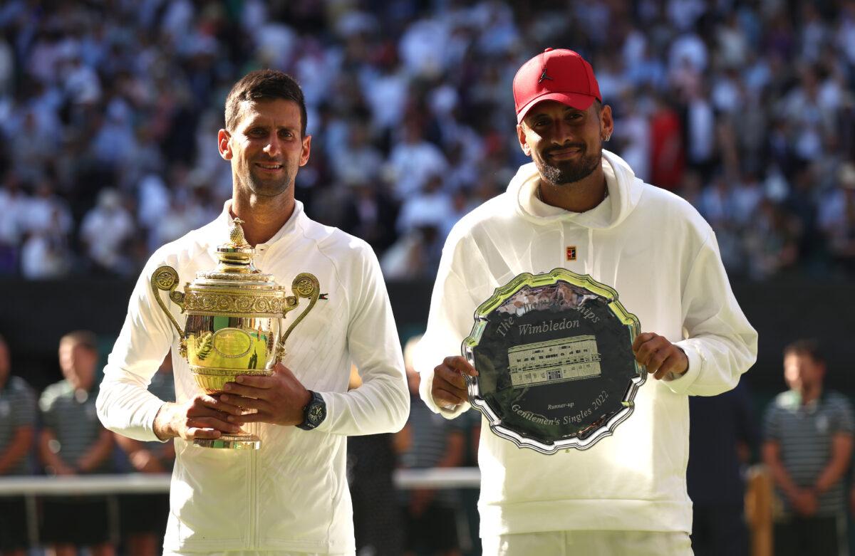 Winner Novak Djokovic of Serbia (L) and runner up Nick Kyrgios of Australia pose for a photo with their trophies following their Men's Singles Final match on day fourteen of The Championships Wimbledon 2022 at All England Lawn Tennis and Croquet Club in London on July 10, 2022. (Julian Finney/Getty Images)
