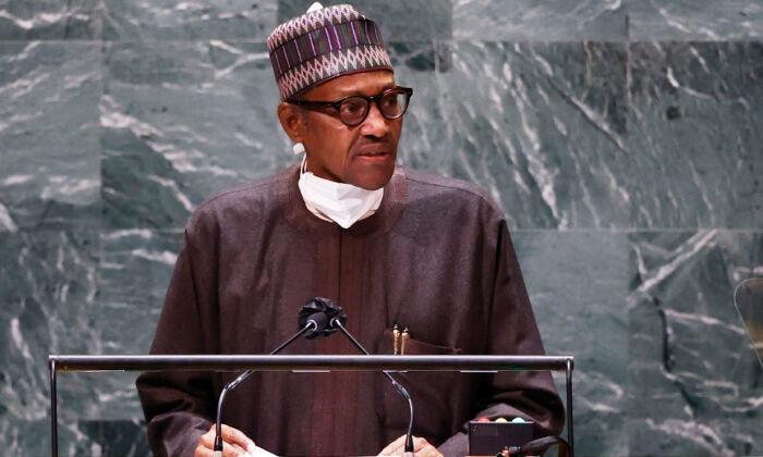 Nigeria’s Buhari Steps Down as President Amid Religious Massacres and War Crimes Allegations