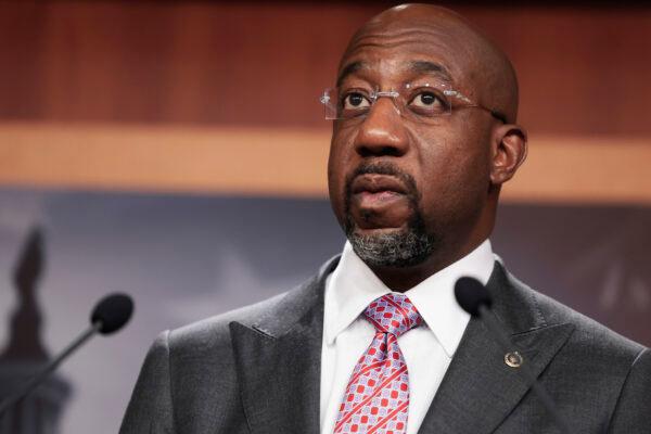 Sen. Raphael Warnock (D-Ga.) speaks at a press conference following a virtual weekly Senate Democratic Policy meeting at the U.S. Capitol in Washington on Jan. 4, 2022. (Photo by Anna Moneymaker/Getty Images)