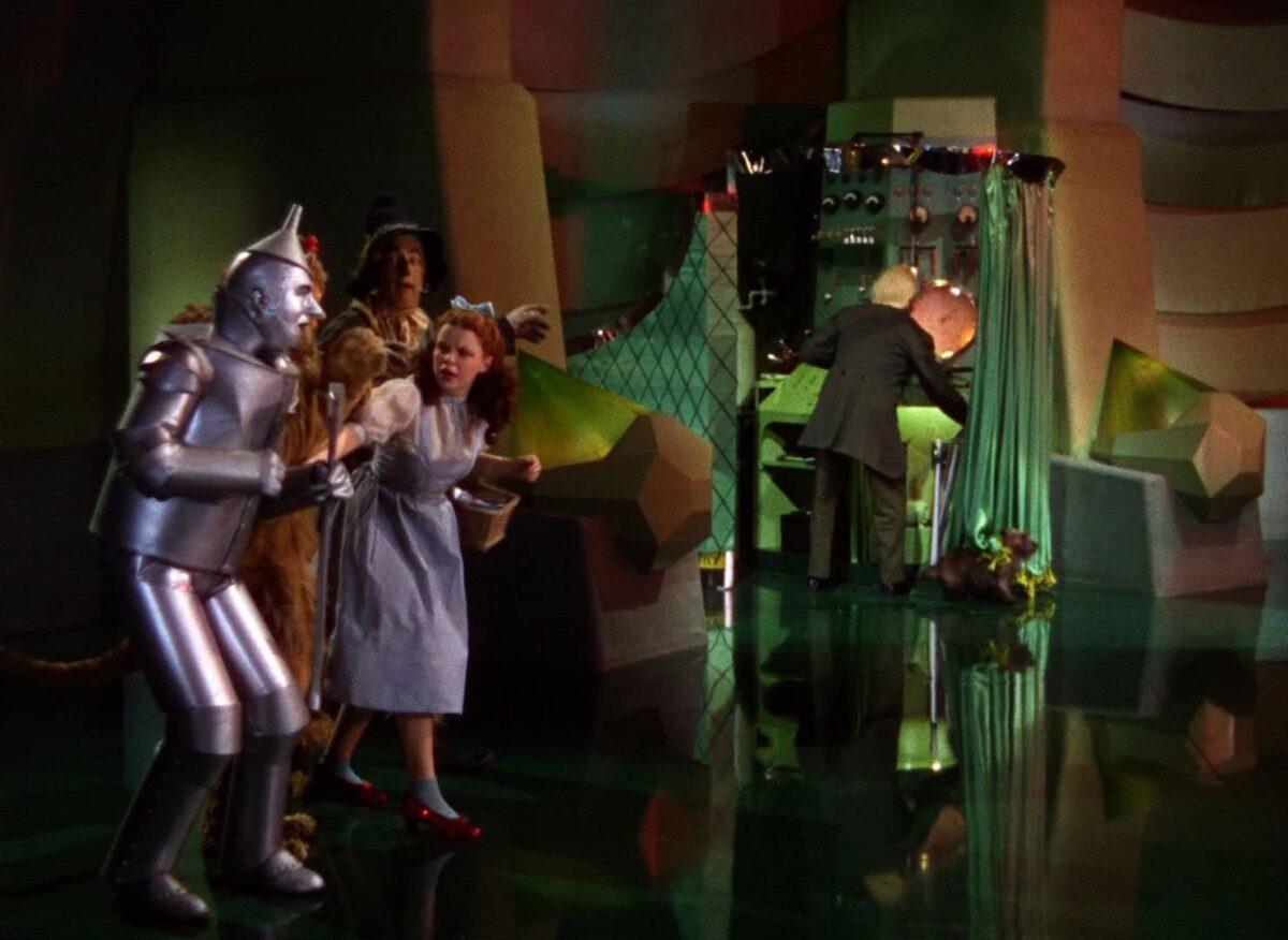A scene from the movie “The Wizard of Oz” (1939) revealing the man behind the curtain. (Public Domain)