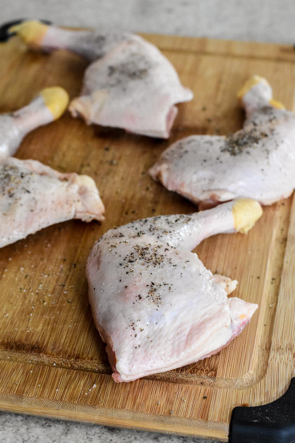 Thoroughly dry the chicken pieces and season with salt and pepper. (Audrey Le Goff)