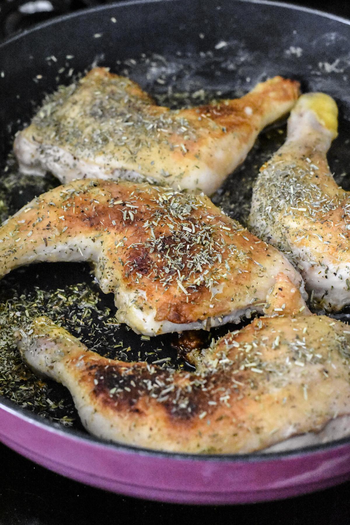 Brown the chicken on both sides in a hot pan, and sprinkle with herbes de Provence. (Audrey Le Goff)