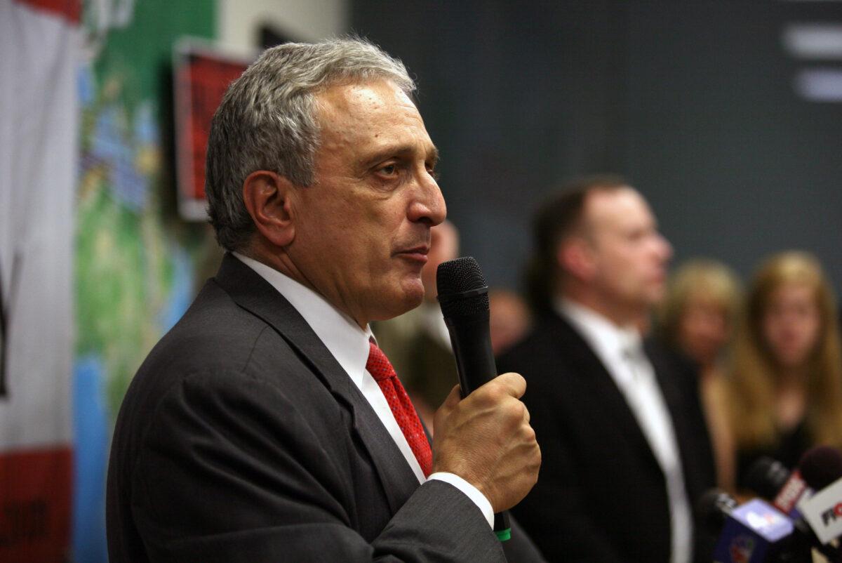 Then-Republican gubernatorial candidate Carl Paladino speaks to his supporters at American Defense Systems in Hicksville, N.Y., on Oct. 26, 2010. (Hiroko Masuike/Getty Images)