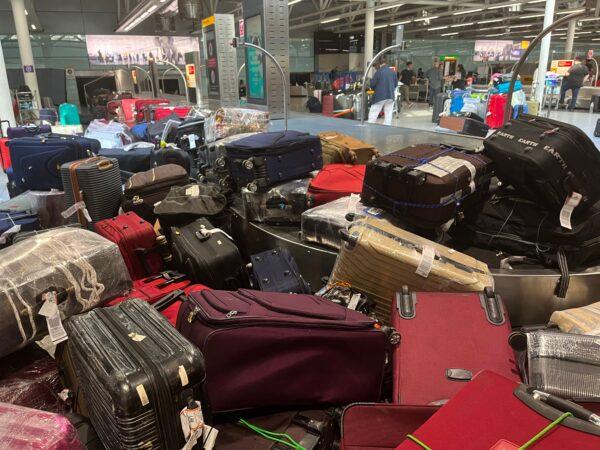 Suitcases are seen uncollected at Heathrow Airport's Terminal 3 baggage reclaim, west of London, on July 8, 2022. (Paul Ellis/AFP via Getty Images)