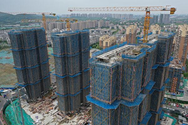 A commercial housing community under construction in Nanjing, East China's Jiangsu Province on April 15, 2022. (Costfoto/Future Publishing via Getty Images)