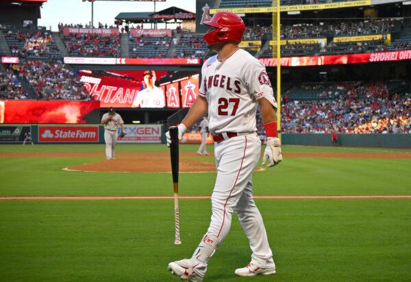 Mike Trout #27 of the Los Angeles Angels walks back to the dugout after striking out in the third inning against the Houston Astros at Angel Stadium of Anaheim, in Anaheim, on July 12, 2022. (Jayne Kamin-Oncea/Getty Images)