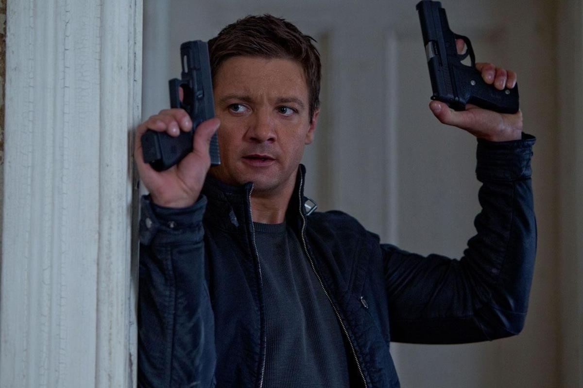Aaron Cross (Jeremy Renner) rescuing of the doctor in charge of his meds, in "The Bourne Legacy." (Universal Pictures)