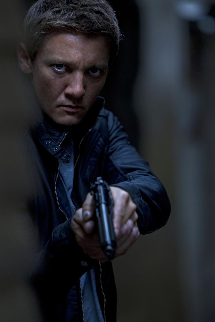 Outcome agent Aaron Cross (Jeremy Renner) rescuing doctor Marta Shearing, in "The Bourne Legacy." (Universal Pictures)