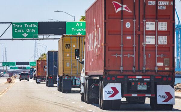 Trucks make their way to the Port of Long Beach, Calif., on July 13, 2022. (John Fredricks/The Epoch Times)