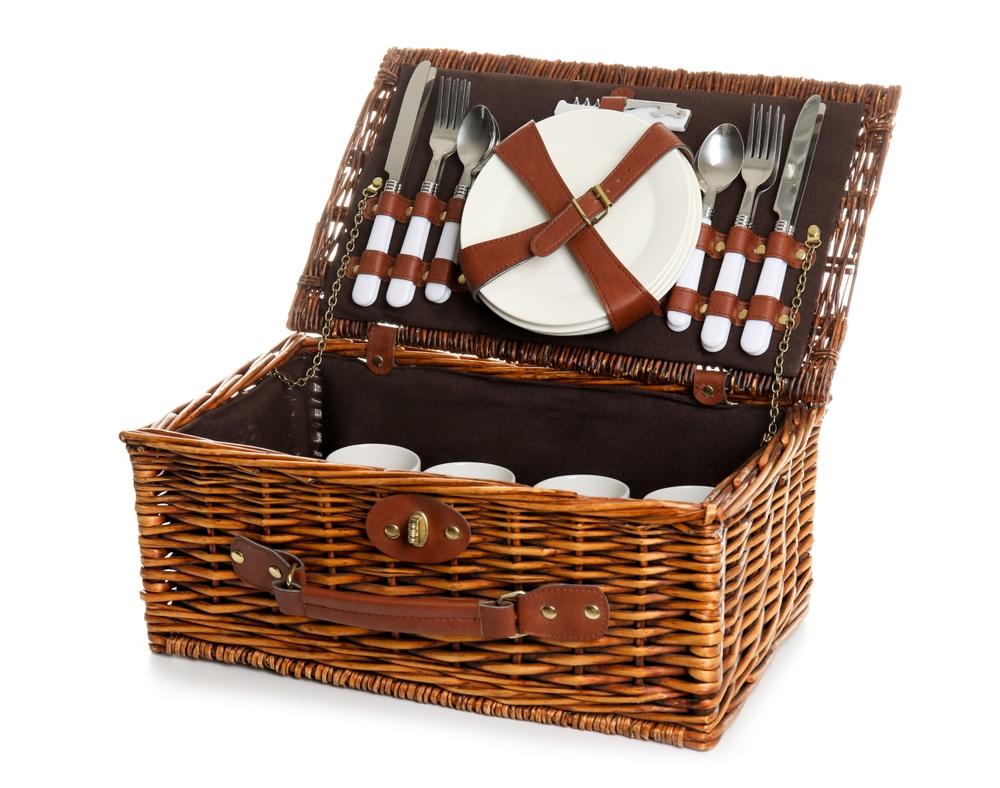 For a two- to four-person picnic, a traditional basket can hold all the goodies, but as the guest list swells, your minivan may become the “picnic basket.” (Pixel-Shot/Shutterstock)