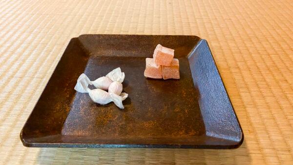 Guests are given a tray of sweets during a Japanese tea demonstration at Hakone Gardens on July 7, 2022. (Ilene Eng/NTD Television)