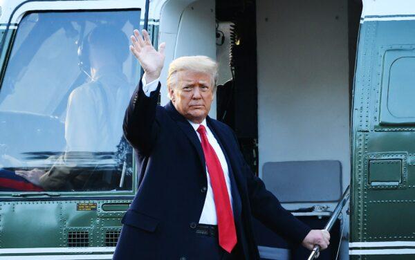 Outgoing President Donald Trump waves as he boards Marine One at the White House on Jan. 20, 2021. (Mandel Ngan/AFP via Getty Images)