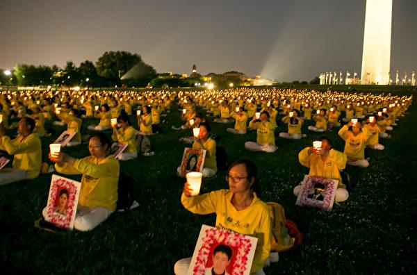 Falun Gong practitioners gathered at Washington D.C. to commemorate the 22nd anniversary of persecution in China on July 16, 2021. (Li Sha/The Epoch Times)