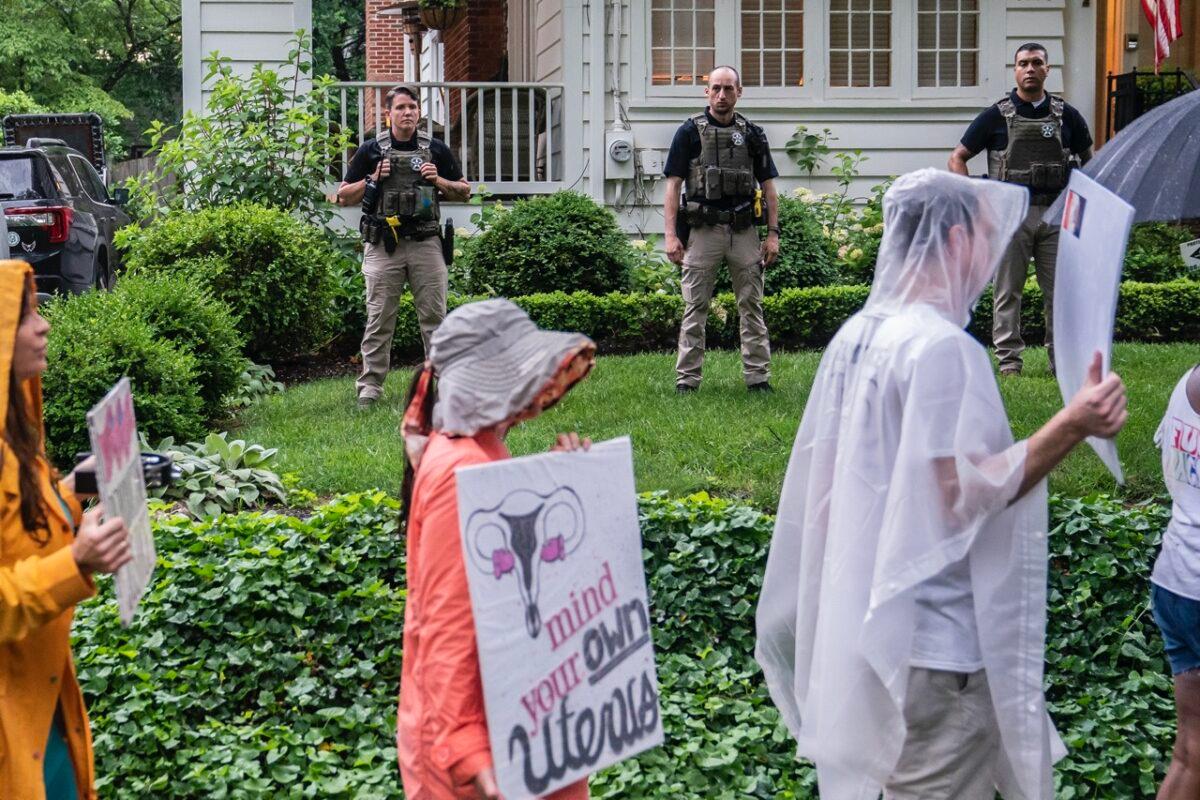 Protesters march past Supreme Court Justice Brett Kavanaugh's home in Chevy Chase, Md., on June 8, 2022. (Nathan Howard/Getty Images)