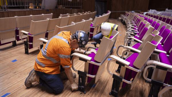 Reinstalling the 2,000 chairs in the Concert Hall auditorium. (Anna Kucera)
