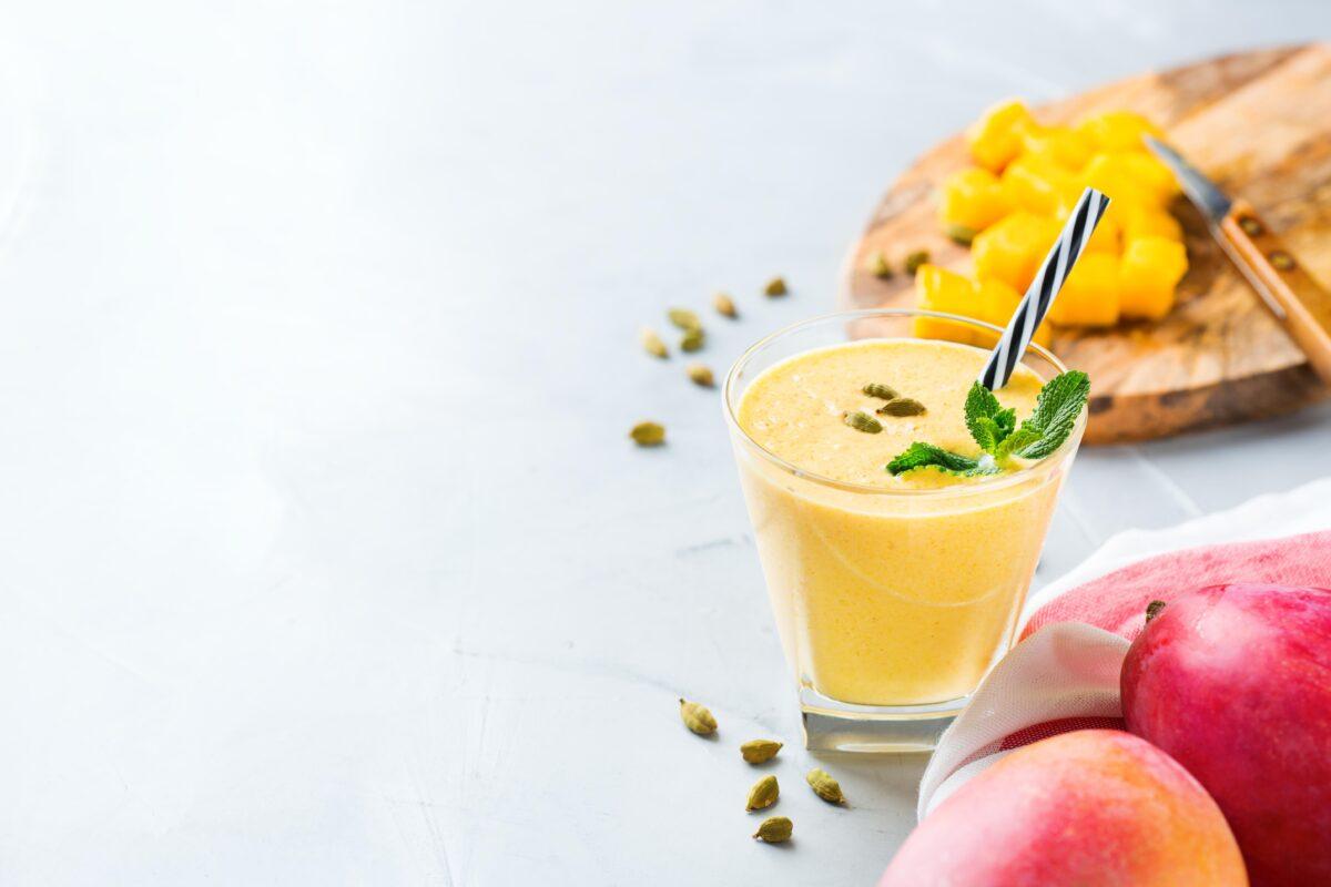 Mango lassi blends sweet mangos with plain yogurt, sugar, milk and ice.<br/>(Aamulya/iStock / Getty Images Plus)