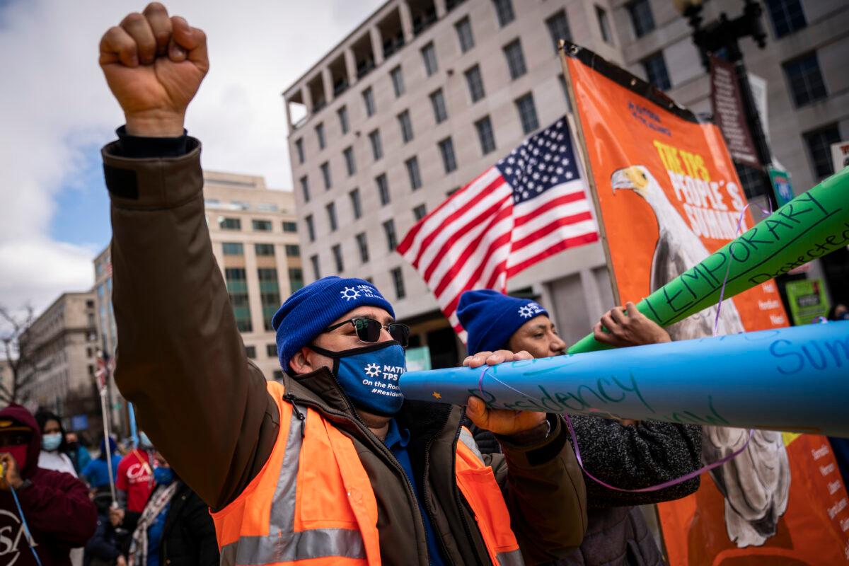 Activists and with Temporary Protected Status (TPS) march in Washington on Feb. 23, 2021. (Drew Angerer/Getty Images)